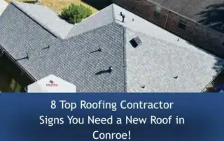 Aerial view of a residential roof with new gray shingles and multiple roof vents.